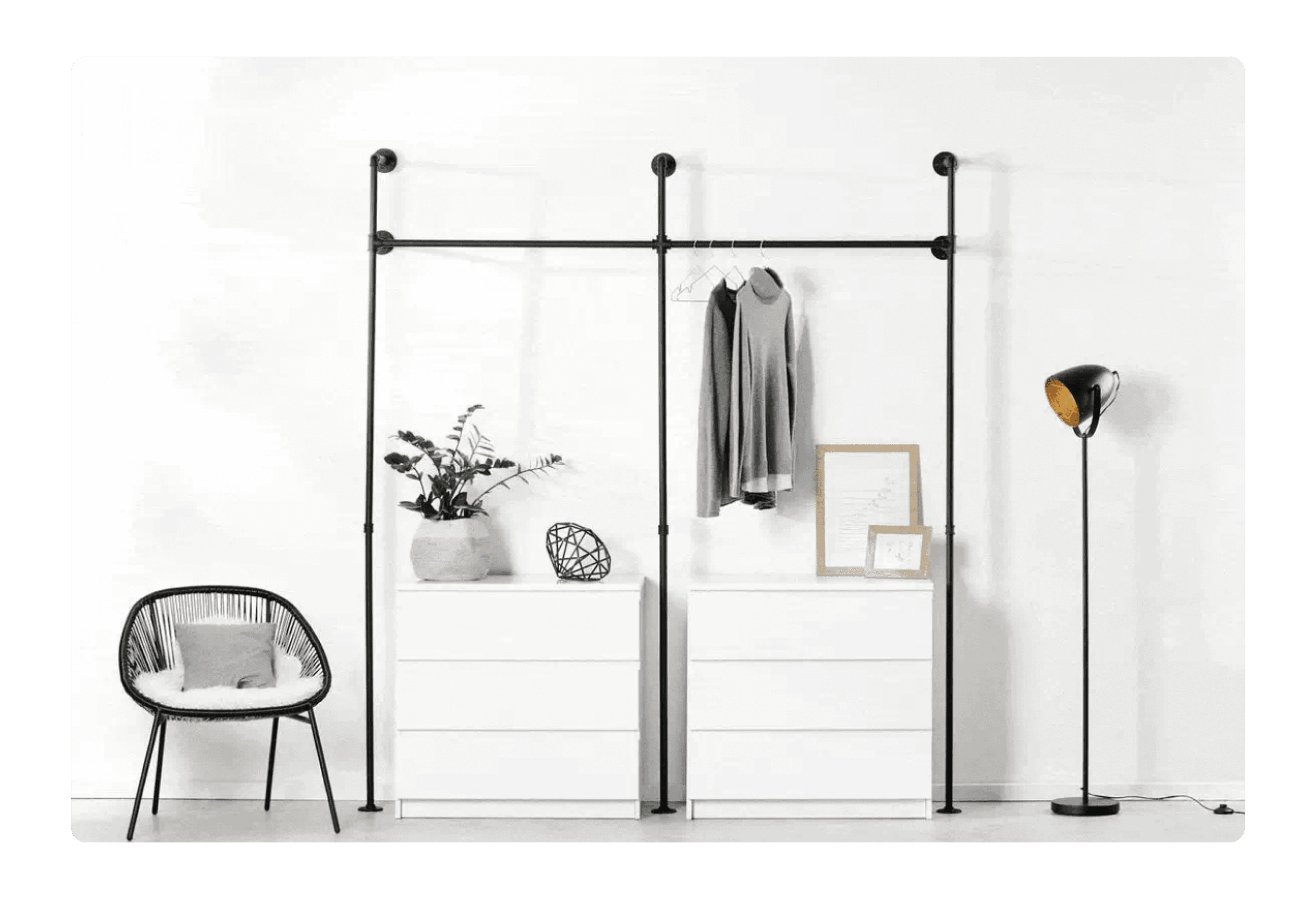 clothing rack, white drawers, a chair and a lamp